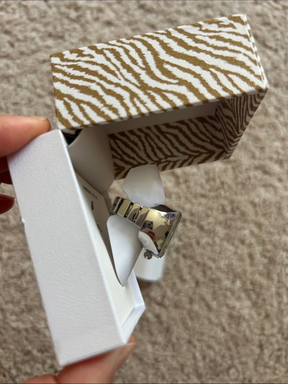 Jessica Simpson elastic ring watch.